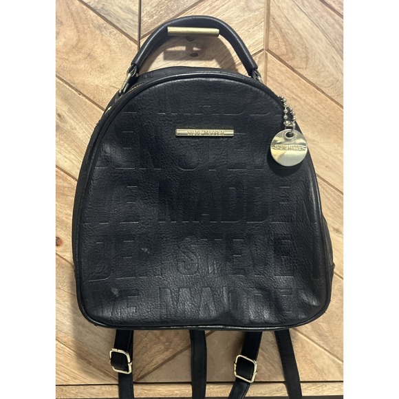 Steve Madden Handbags - Steve Madden Small Backpack Embossed Logo Black & Gold Faux Leather Womens Bag